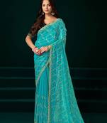 Turquoise net jaal pattern sequence embroidery thread work party wear saree