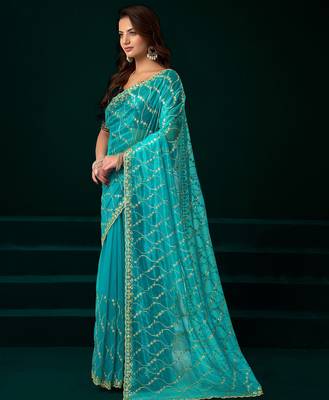 Turquoise net jaal pattern sequence embroidery thread work party wear saree 2
