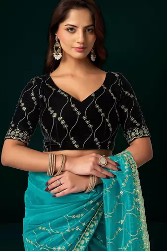 Turquoise net jaal pattern sequence embroidery thread work party wear saree