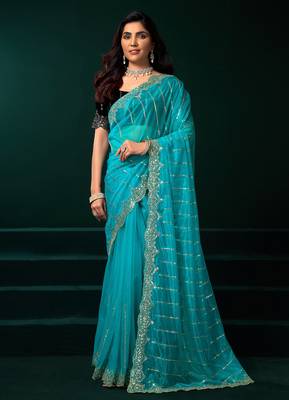Turquoise blue net shimmering lines sequence embroidery party wear saree 1