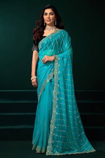 Turquoise blue net shimmering lines sequence embroidery party wear saree