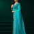 Turquoise blue net shimmering lines sequence embroidery party wear saree
