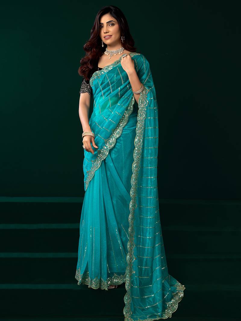 Turquoise blue net shimmering lines sequence embroidery party wear saree