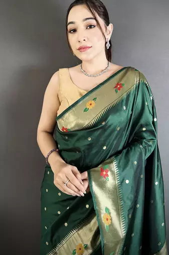 dark green lichi silk blend parrot & floral woven design zari weaving paithani saree