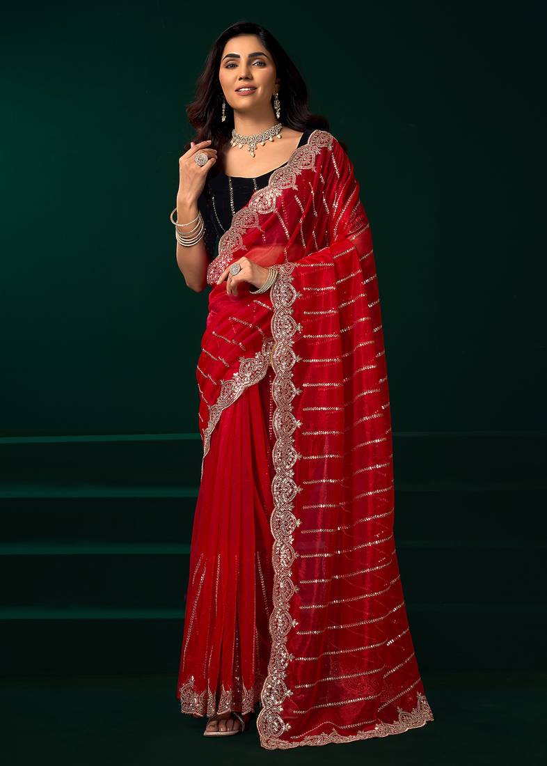 Red net shimmering lines sequence embroidery party wear saree