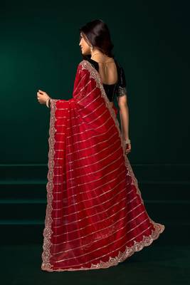 Red net shimmering lines sequence embroidery party wear saree 3