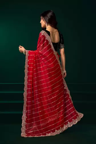 Red net shimmering lines sequence embroidery party wear saree