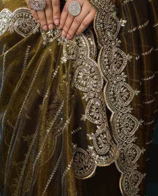 Mehendi green net shimmering lines sequence embroidery party wear saree 5