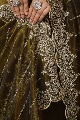 Mehendi green net shimmering lines sequence embroidery party wear saree