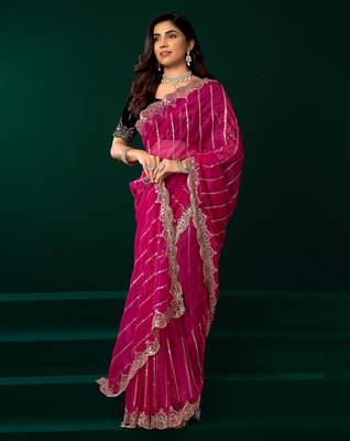 Rani pink net shimmering lines sequence embroidery party wear saree 5