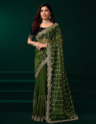 Green net shimmering lines sequence embroidery party wear saree 1