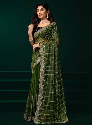 Green net shimmering lines sequence embroidery party wear saree 2