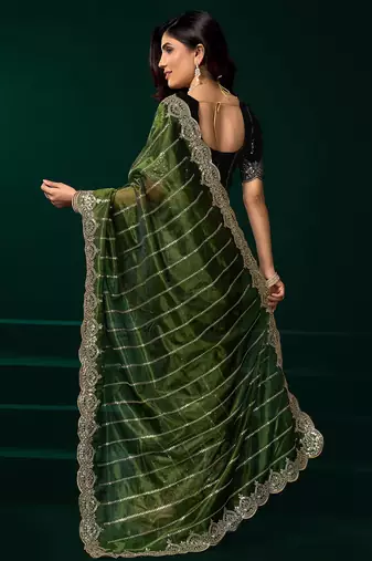 Green net shimmering lines sequence embroidery party wear saree