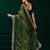 Green net shimmering lines sequence embroidery party wear saree