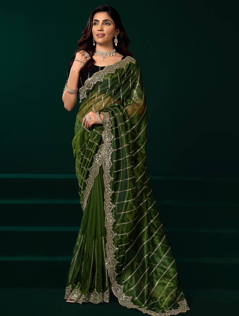 Green net shimmering lines sequence embroidery party wear saree