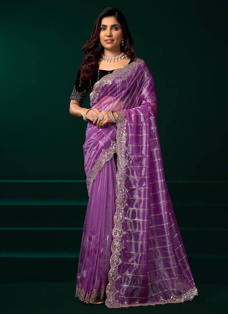 Lavender net shimmering lines sequence embroidery party wear saree