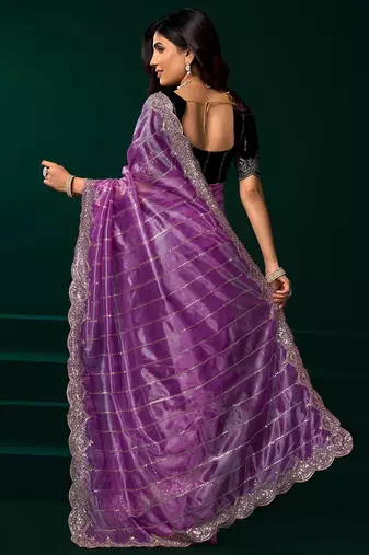 Lavender net shimmering lines sequence embroidery party wear saree