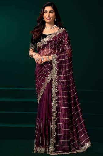 Purple net shimmering lines sequence embroidery party wear saree