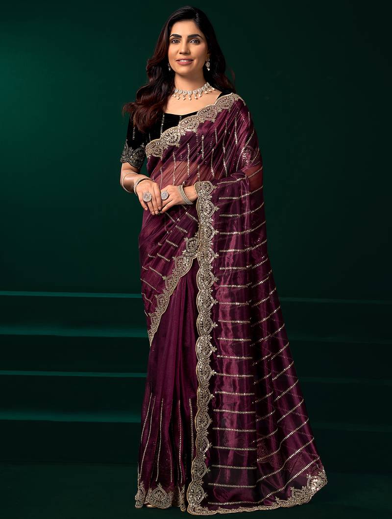 Purple net shimmering lines sequence embroidery party wear saree