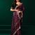 Purple net shimmering lines sequence embroidery party wear saree