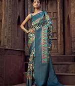 blue jacquard p v silk blend digital floral print zari weaving bollywood saree