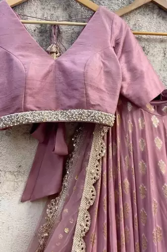 peach banarasi georgette lehenga choli with gold motifs