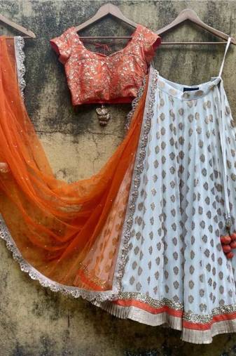 orange banarasi georgette lehenga choli with gold motifs