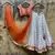 orange banarasi georgette lehenga choli with gold motifs