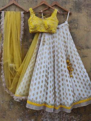 yellow banarasi georgette lehenga choli with gold motifs 1