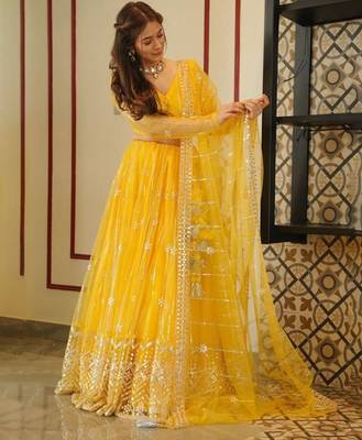 yellow embroidery net designer lehenga choli set 1