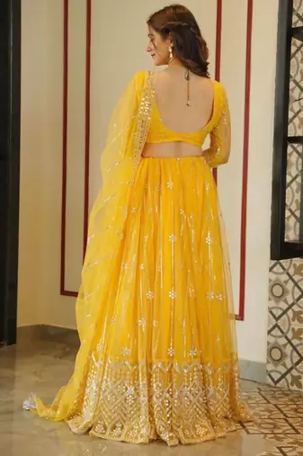 yellow embroidery net designer lehenga choli set