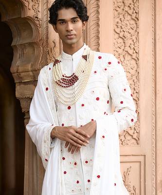 Ivory embroidered rawsilk sherwani 1