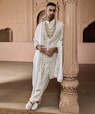 Ivory embroidered rawsilk sherwani 1