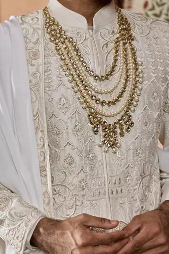 Ivory embroidered rawsilk sherwani