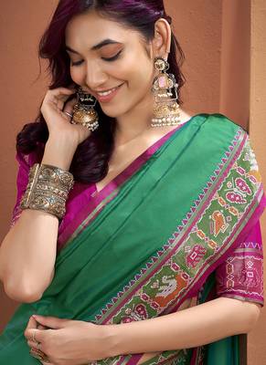 Green patola silk party wear saree 4