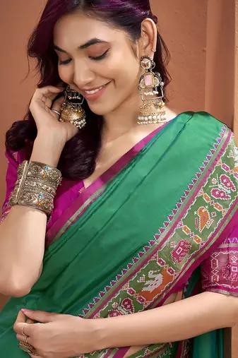 Green patola silk party wear saree