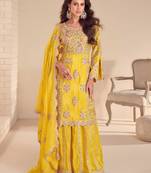 yellow shimmer suit with hand & embroidery work - full stitched free size