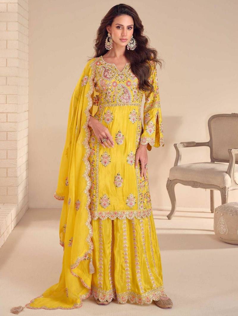 yellow shimmer suit with hand & embroidery work - full stitched free size