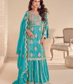 turquoise shimmer suit with hand & embroidery work-full stitched free size