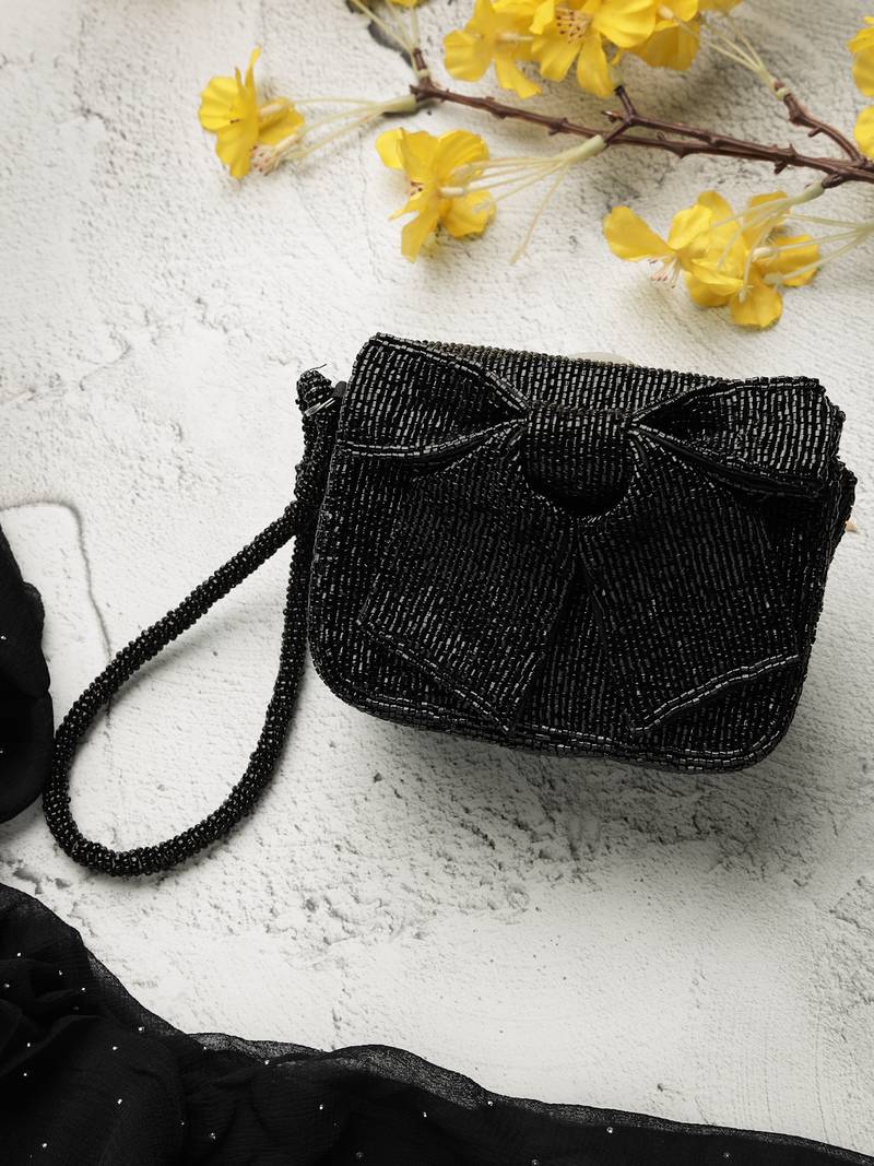 Anekaant beaded muse black cotton statement bow embellished clutch