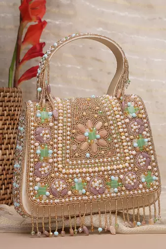Anekaant blush & bead gold satin concentric beadwork embellished clutch