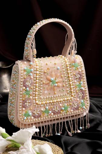 Anekaant blush & bead pink satin concentric beadwork embellished clutch