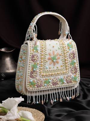 Anekaant blush & bead ivory satin concentric beadwork embellished clutch 1