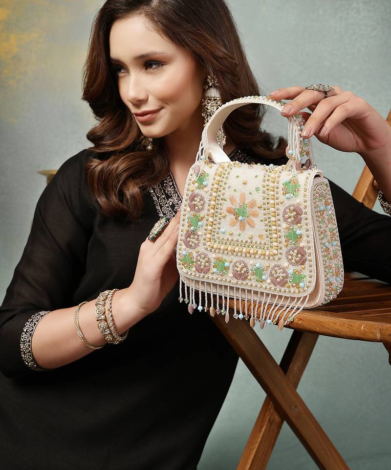 Anekaant blush & bead ivory satin concentric beadwork embellished clutch