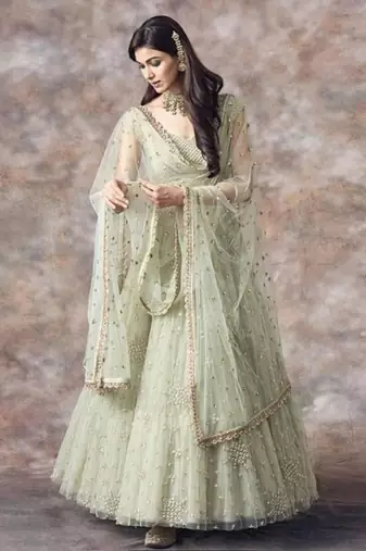 pista green net ruffle lehenga choli with embroidered dupatta