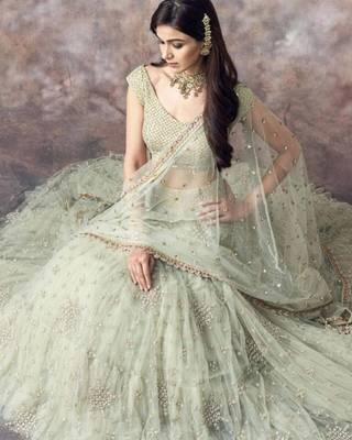 pista green net ruffle lehenga choli with embroidered dupatta 4