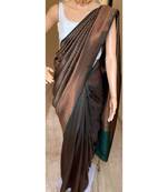 Ethnic green banarasi silk woven saree with unstitched blouse
