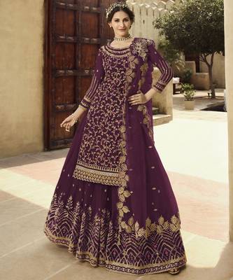 Soft premium net wedding wear sharara in light violet color with embroidery work 1