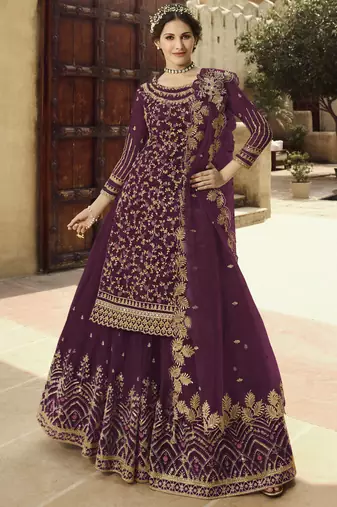 Soft premium net wedding wear sharara in light violet color with embroidery work
