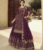 Soft premium net wedding wear sharara in light violet color with embroidery work